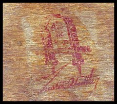 Gustav Stickley red decal signature in the bottom of the second drawer.